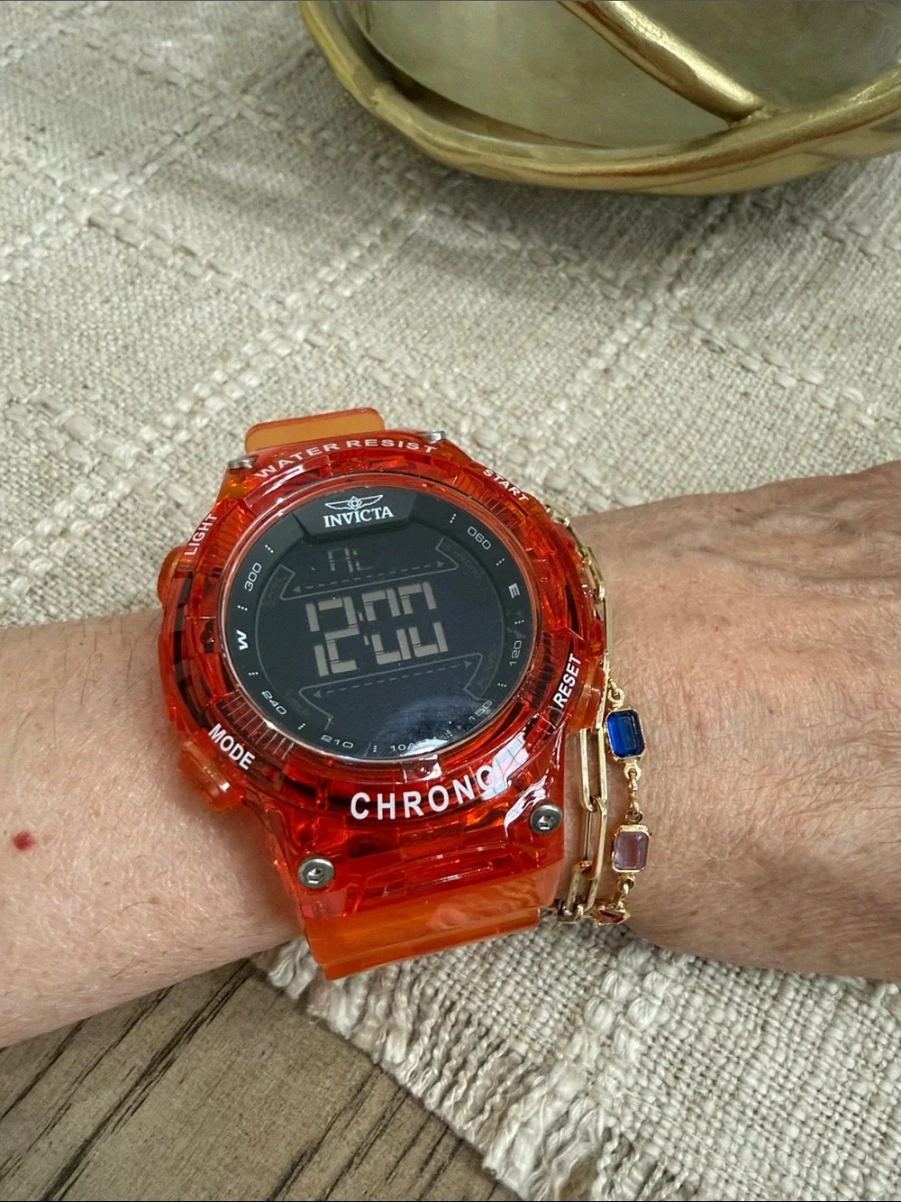 Invicta translucent orange digital chronograph watch